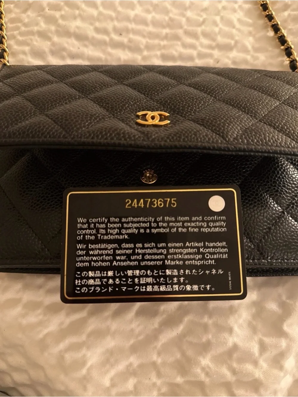 CHANEL Black Quilted Caviar Leather Wallet on Chain with Gold CC